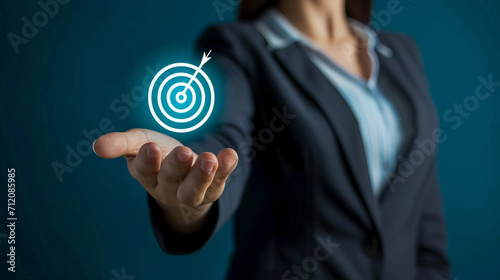 Image of a businesswomen show year goals target icon in hand, management development and digital marketing, banking, Investment financial, Good human development