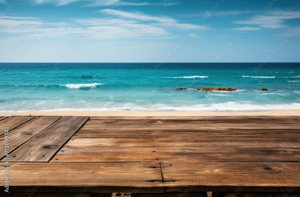 Wooden table placed on a beach with the sea in the background, nature and water image