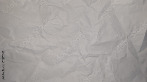 Paper texture big sheet of paper wrinkled crumpled with random creases background photo