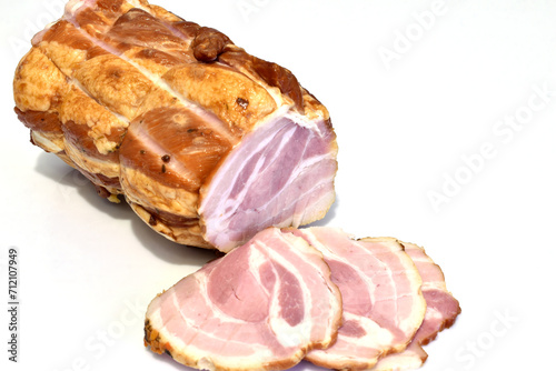 Coppa pork meat and its slices.