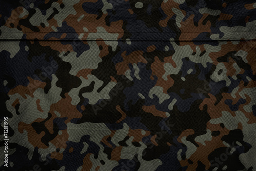 dark brown and blue camouflage tarp texture photo