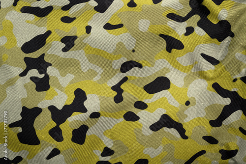 flashy yellowish green army camouflage tarp texture , camo canvas background photo