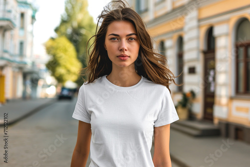 White t-shirt mockup wearing by a female model - Round neck t-shirt mockup © Alone Mockup
