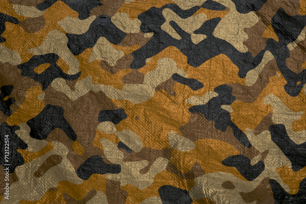 Fototapeta premium brown and orange army camouflage plastic tarp texture , camo waterproof mesh background