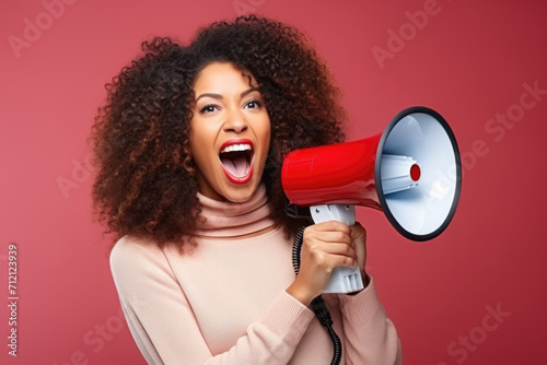 Excited Woman with Megaphone on Red Background.