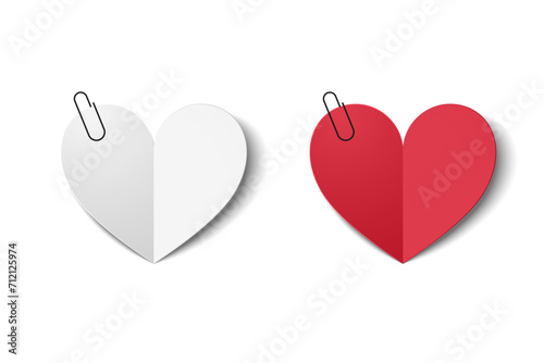 Heart made of red and white paper. origami. Isolated with shadow on a white background. Paper valentines on paper clips.