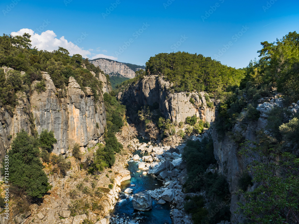 View from above of a rock fall into a river in the Koprulu Canyon in Turkey