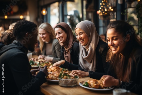 Employees of various nationalities sharing a breakroom meal, uniting through the joy of food and conversation, Generative AI © Shooting Star Std