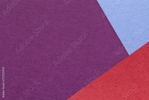 Texture of craft purple color paper background with blue and red border. Vintage abstract violet cardboard.