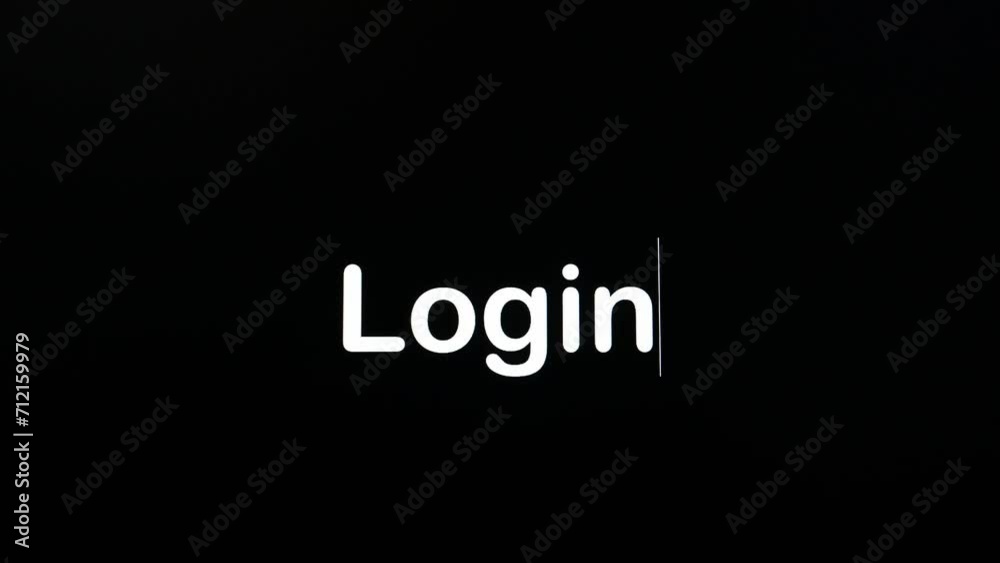 Writing on the screen with a flashing paragraph forming the word Login, in white on a black background Writing on the screen with a flashing paragraph forming the word Login, in white on a black background