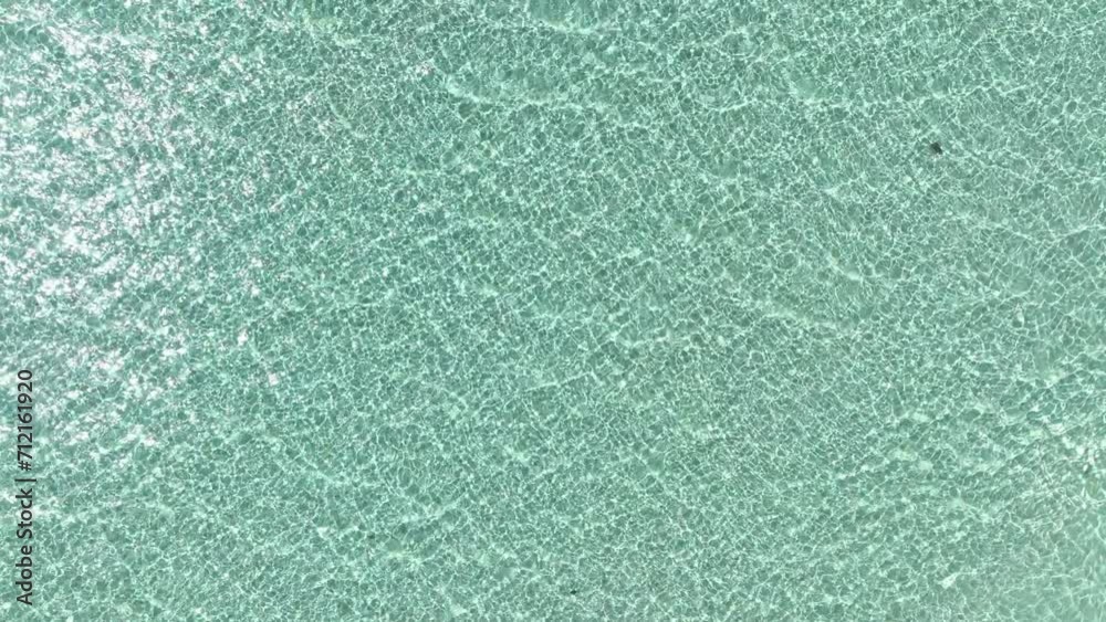Tropical beach water with crystal clear water on beach background Tropical beach water with crystal clear water on beach background