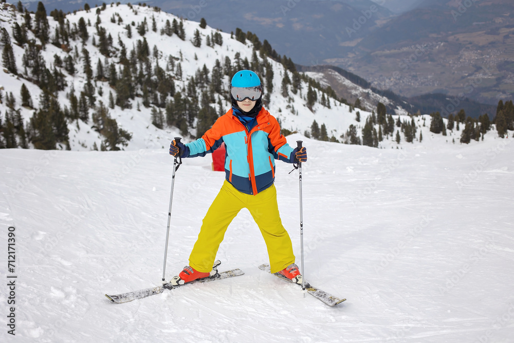 Happy family, enjoying ski holiday with children, sunny beautiful weather Happy family, enjoying ski holiday with children, sunny beautiful weather