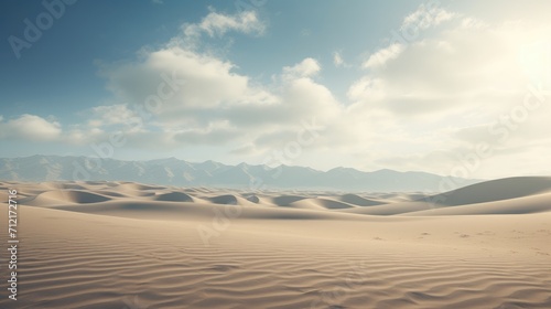 Rippled sand dunes in a desert landscape with a mountain and cloud background