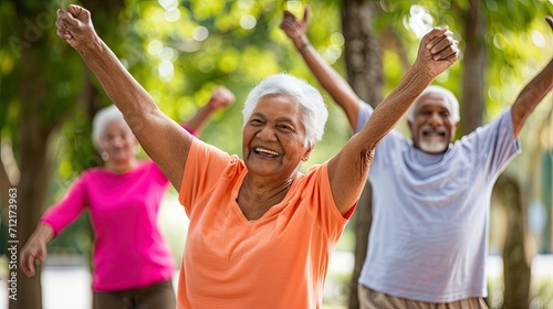 Joyful Seniors Exercising Together in Sunny Park. © _veiksme_