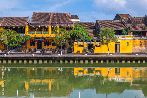 Scenery of the riverbank of Hoi An ancient town, an unesco heritage site in Vietnam photo