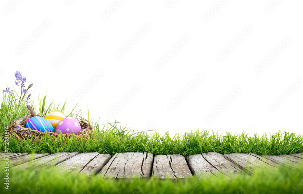 A template with three painted easter eggs in a birds nest celebrating a Happy Easter with a wooden bench to place products on with green grass and transparent background