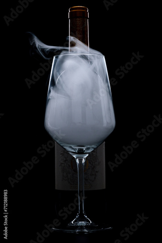smoke filled wine glass bottle silhouette