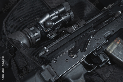 AKM assault rifle with gt14 night vision device, close-up photo.