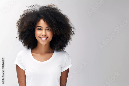 Beautiful happy woman with afro hairstyle portrait. Generative ai design. © PicItUp