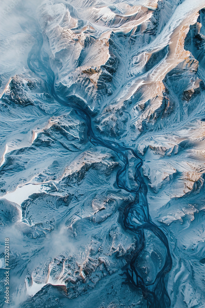 Overhead shots of mountain ranges showcasing abstract patterns.