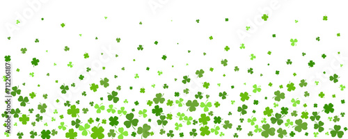 St. Patrick Day shamrock clover background. Seamless vector border with flying green leaves for posters banners and greeting cards.