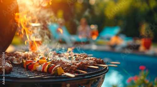 Fotografie, Obraz A poolside barbecue party with sizzling grills, delicious aromas, and casual sum