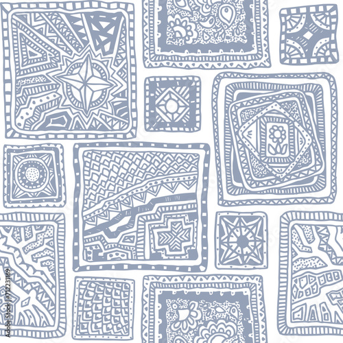 Vector seamless patchwork pattern. Hand drawn blue square tiles with geometrical ornaments on a white background