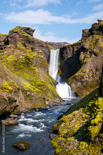 Fototapeta Naklejka Na Ścianę i Meble -  Long exposure view of famous waterfalls of river Skógá. Skógafoss. Magnificent Iceland in august. Fimmvörðuháls Hiking Trail. Popular Travel destinations. 
