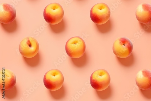 Fresh wet apricot or peach on light orange background. Colorful fruit pattern. Creative food concept. Vegan  vegetarian. Peach fuzz color. Flat lay  top view