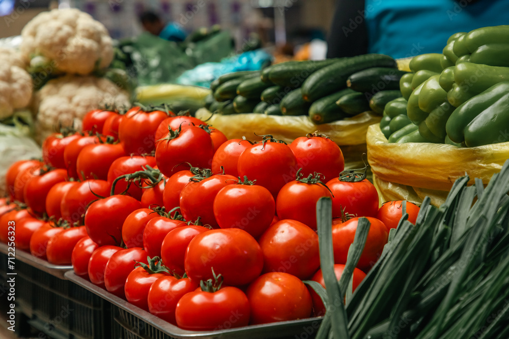light reflecting red tomatoes in the market light reflecting red tomatoes in the market