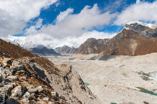 Pass through Ngozumpa glacier from Gokyo to Dzongla in Himalaya mountains during EBC Everest bace camp or Three passes trekking in Sagarmatha, Khumjung, Nepal. photo