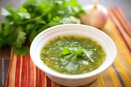 salsa verde garnished with cilantro on a plate