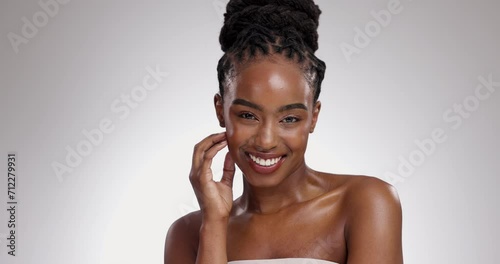 Woman, face and smile with beauty in studio for glowing skin, wellness and detox with collagen. African model, portrait and mockup for facial treatment, body care or skincare on white background photo