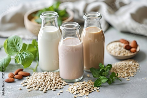 Variety of plant milk bottles soy almond and oat milk