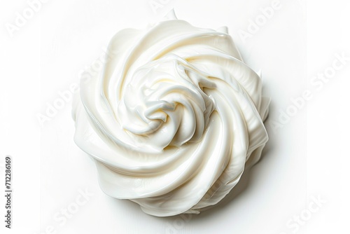 Creamy white mousse swirl of whipped cleansing gel isolated on white background photo