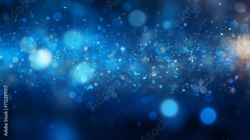 blue glow particle abstract bokeh background © Sonya