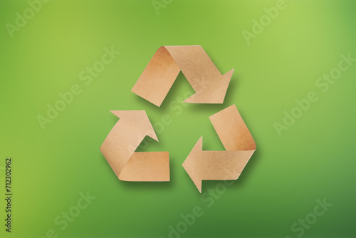 Recycle symbol made of cardboard paper. Refuse reuse recycle concept.