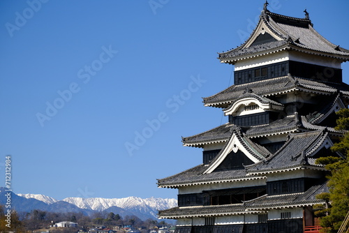 松本城と冬の北アルプス photo