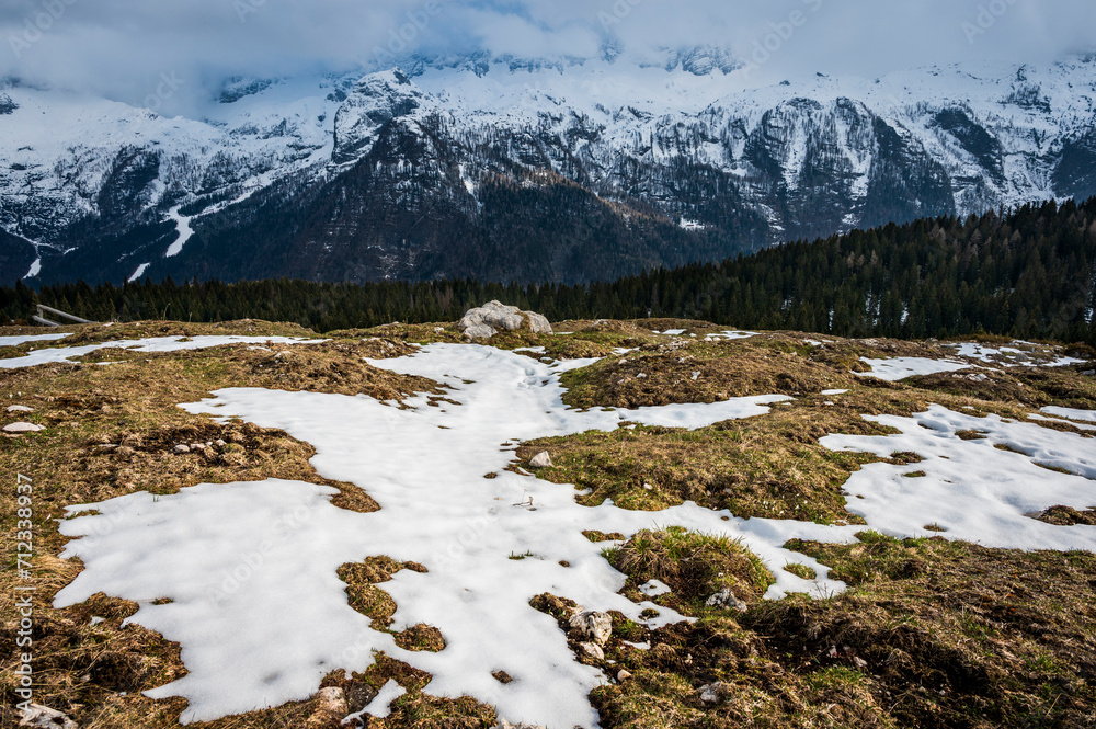Fototapeta premium Snow on Mount Canin and Montasio. Spring snow