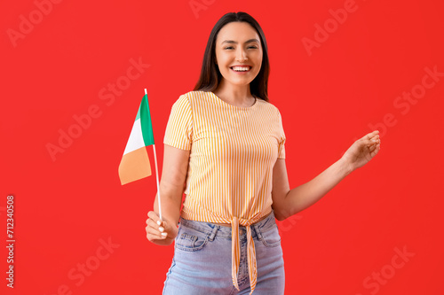 Young woman with flag of It...