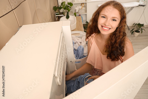 Smiling young woman loading...