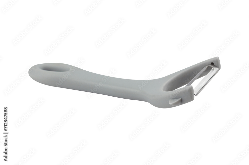 vegetable peeler with plastic handle isolated from background