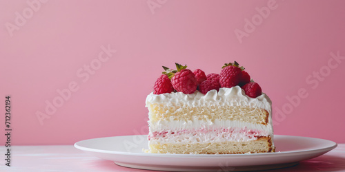 Strawberry Topped Tres Leches Cake closeup. A slice of creamy tres leches cake garnished with fresh strawberries and dusted with cocoa  served on a pastel background.