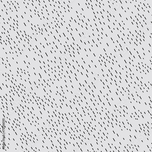 Water drops on a glass. Monochrome seamless pattern. Many small black dashes on a gray background. Abstract background with diagonal lines.  Minimalist print for your design.