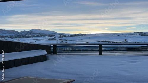 Luxury winter wellness and spa hotel in the Dolomites overlooking snowy mountains