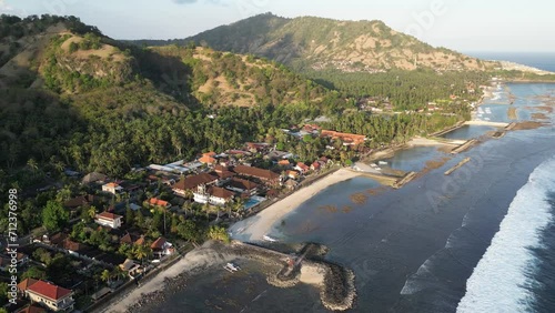 Aerial shot of Candidasa seaside town on the eastern coast of Bali, Indonesia photo