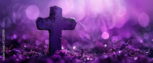 An artistic Ash Wednesday banner featuring a cross adorned with purple ash glitter, symbolizing penitence and the start of Lent.