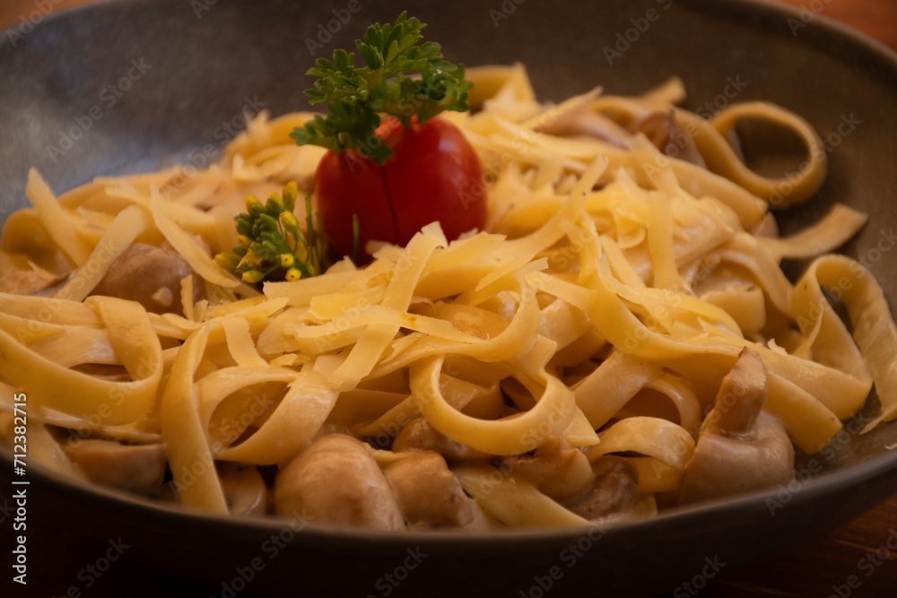 pasta with mushrooms in rustic dish pasta with mushrooms in rustic dish