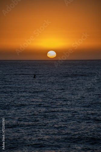 Fototapeta Naklejka Na Ścianę i Meble -  sun setting into the pacific ocean on the chile coast south america destination