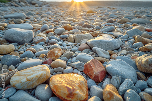 A rocky beach with intricate patterns of pebbles and stones photo